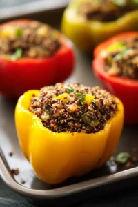 Stuff each bell pepper half with the quinoa mixture