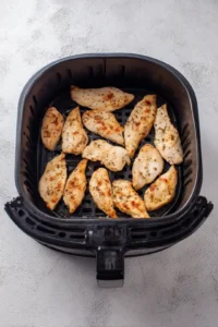 Preheat your air fryer to 400°F (200°C) and cook the tenders for 12 to 15 minutes, flipping halfway through, until they are golden brown and cooked through.