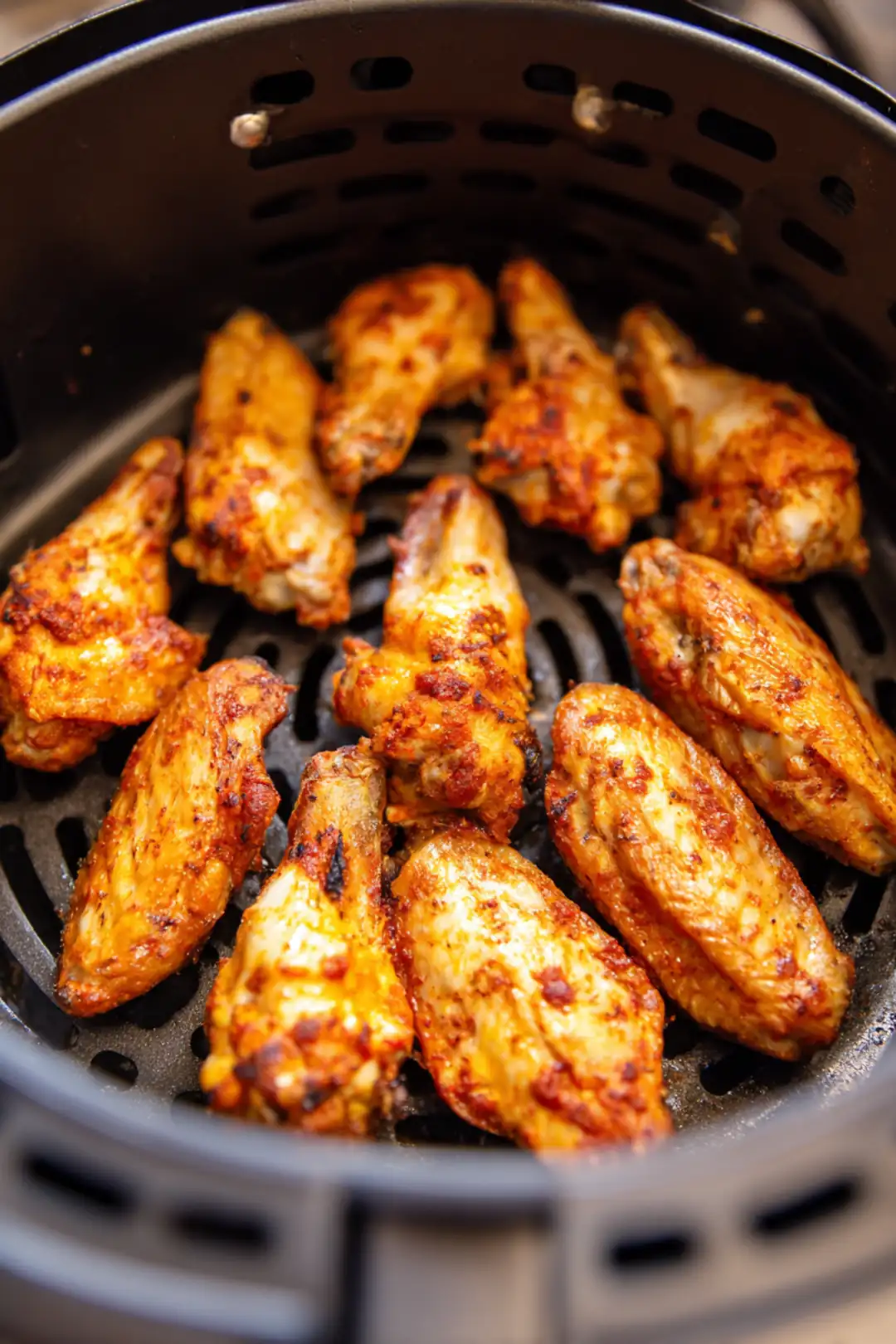 Arrange chicken wings in a single layer in the air fryer