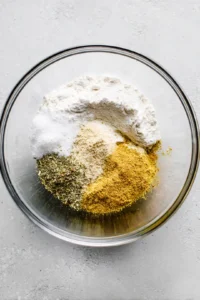 Coat chicken tenders with cornstarch mixture