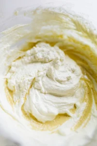 Combine coconut yogurt, tahini, lime juice, and garlic powder in a mixing bowl