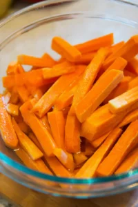 Soak the sweet potato fries in lukewarm water for at least 30 minutes