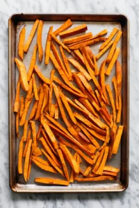 Spread fries in a single layer on baking sheet
