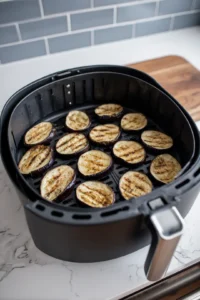Arrange eggplant slices in air fryer