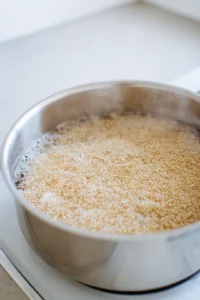 Combine rinsed quinoa and water in a medium saucepan