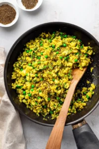Mix together sautéed cumin seeds, mashed potatoes, green peas, spices, and lemon juice