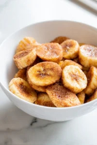 Sprinkle cinnamon and honey over banana slices