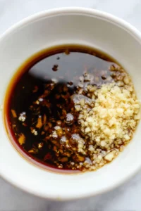 Toss tofu with cornstarch until evenly coated