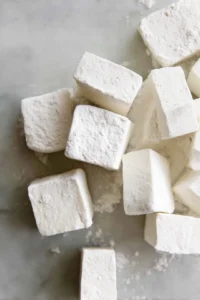Coat tofu cubes in cornstarch and air fry