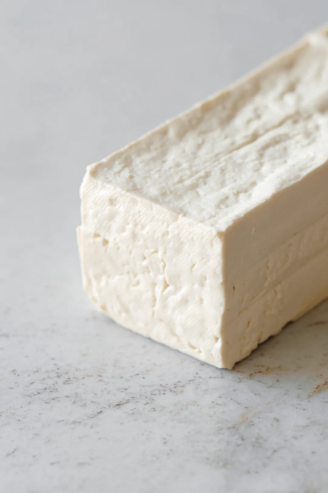 Press tofu to remove excess moisture for crispiness