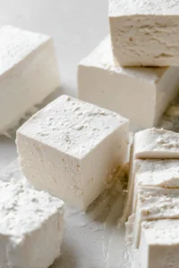 Toss tofu cubes with olive oil and cornstarch