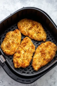 Arrange breaded chicken cutlets in the air fryer
