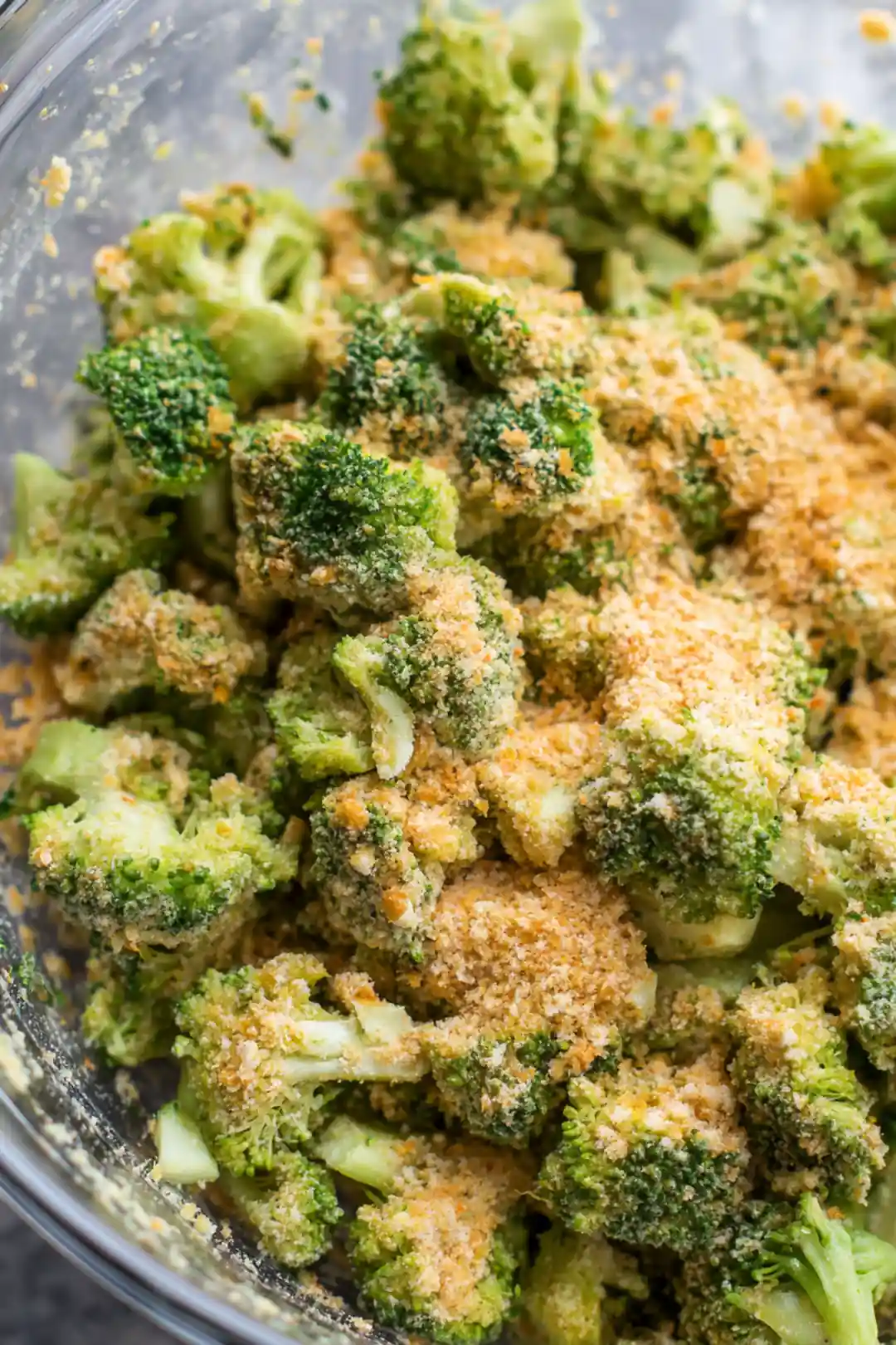 Combine broccoli florets, bread crumbs, cheese, garlic powder, onion powder, and salt in a mixing bowl