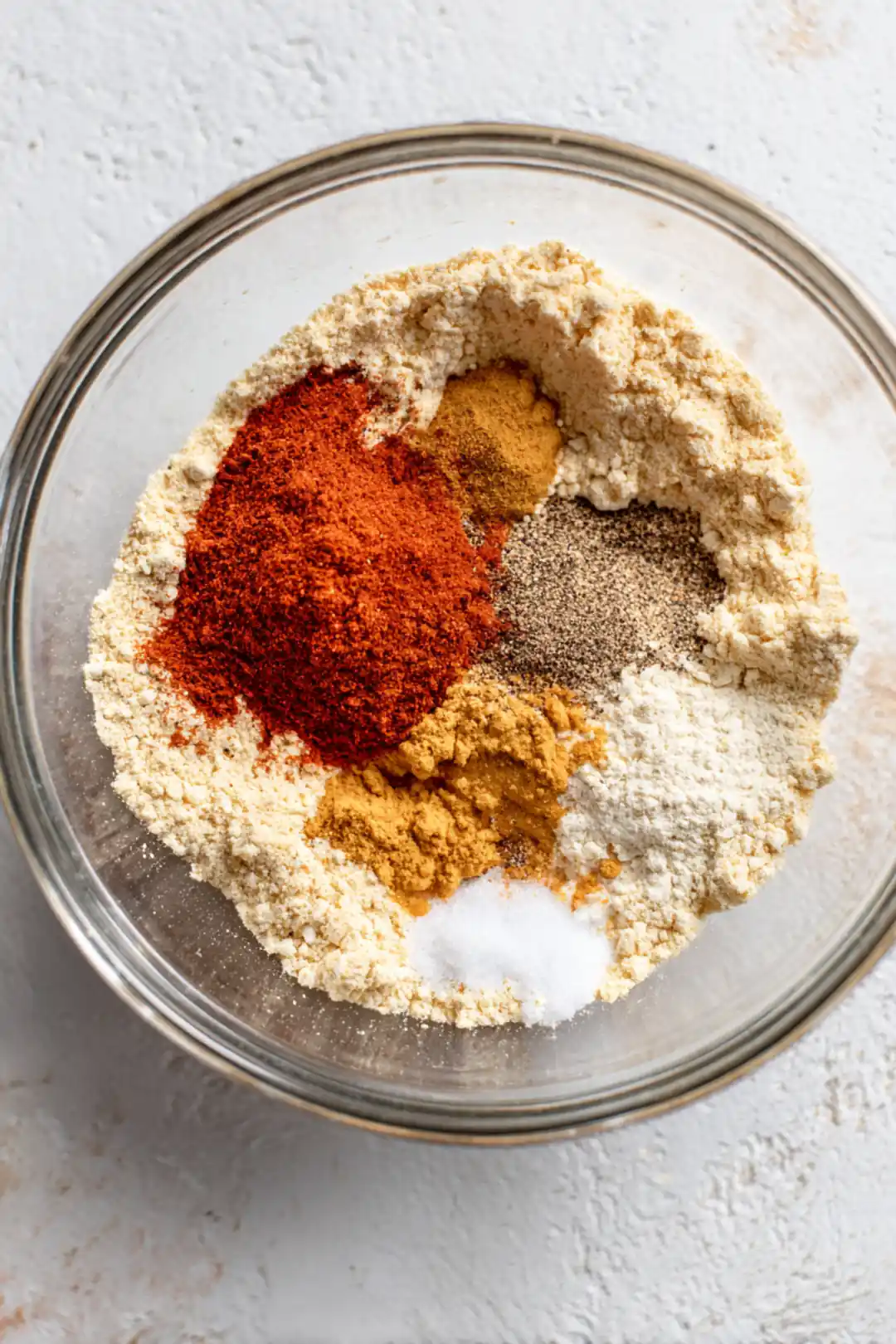 Combine chickpea flour with spices