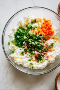 Combine cottage cheese, whole wheat flour, and olive oil in a large bowl