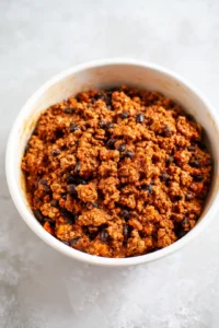 Combine ground turkey, black beans, and taco seasoning in a large bowl