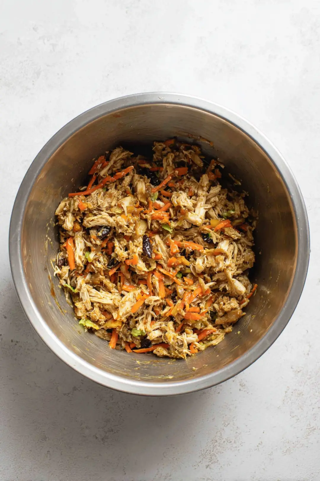 Combine shredded turkey, mixed vegetables, soy sauce, and ginger in a mixing bowl