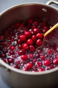 Combine the cranberries, sugar, and water in a medium saucepan and bring to a boil