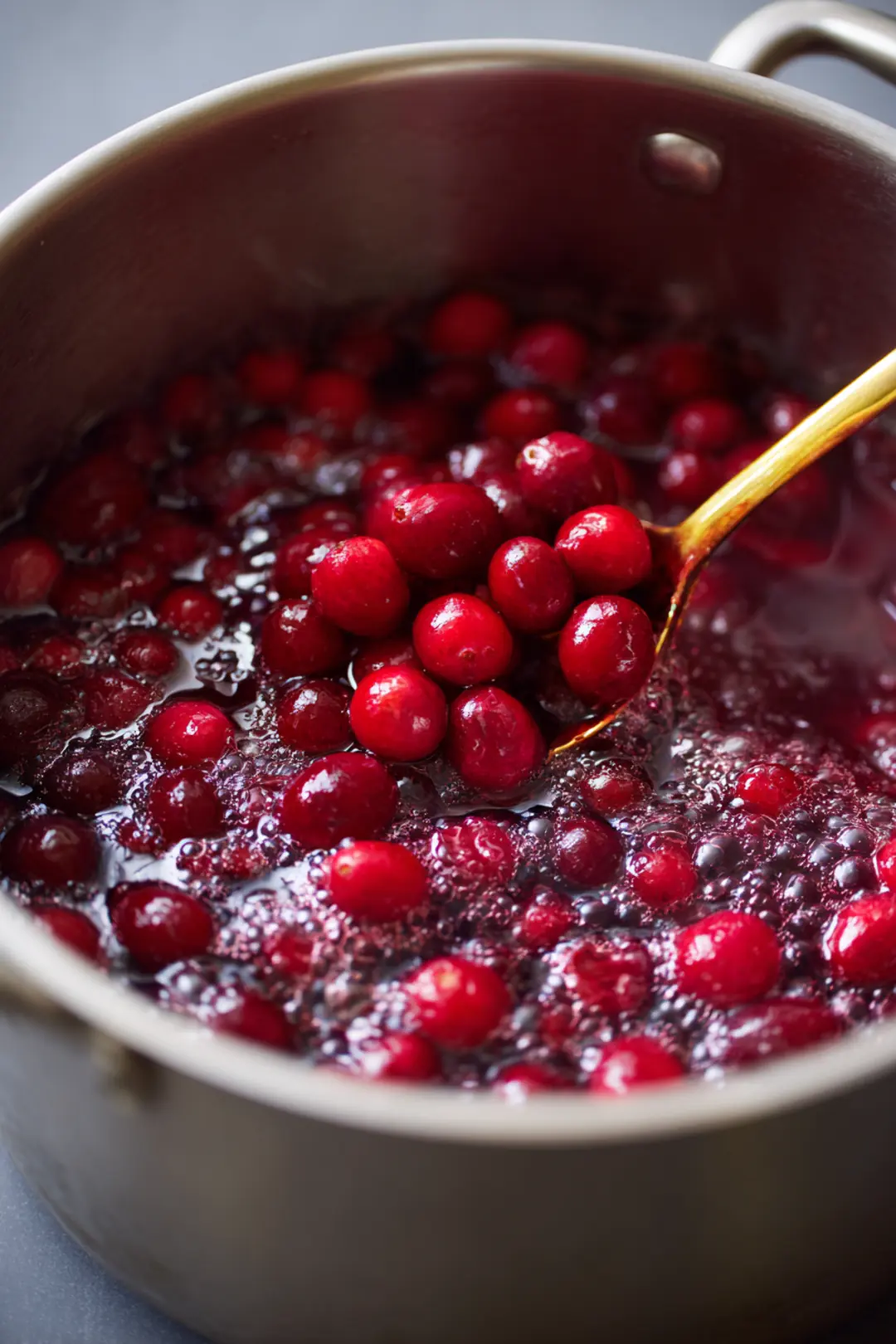 Combine the cranberries, sugar, and water in a medium saucepan and bring to a boil