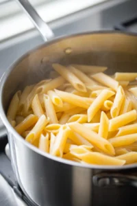 Cook pasta until al dente and let cool