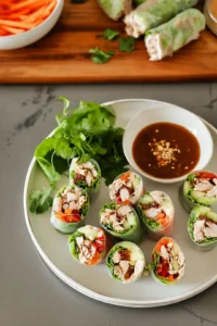Fry the spring rolls in a deep pan until golden brown