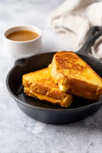 Grill sandwiches in skillet until golden brown