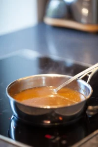 Heat the gravy in a saucepan until warm