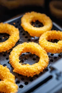 Place coated onion rings in the air fryer