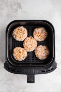 Place the chicken patties in a single layer in the air fryer