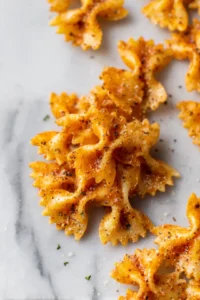 Preheat air fryer to 400°F and cook pasta for 10-12 minutes