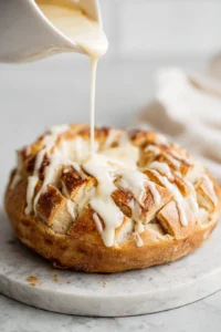 Remove the bread from the oven and unwrap it