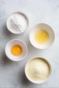 Set up a breading station with three bowls for onion rings
