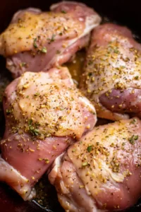 Add chicken thighs to the marinade