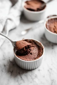 Add egg and vanilla extract to the batter and whisk until smooth and glossy