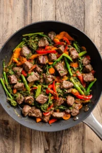 Add mixed vegetables to sauté alongside the steak bites