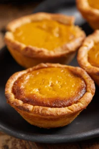 Air fry mini pumpkin pies until golden brown