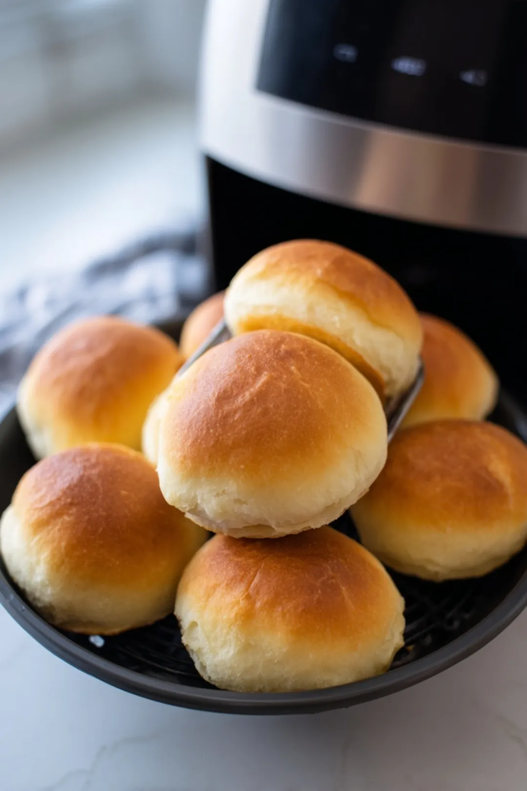 Air fry the filled pandesal for about 10-15 minutes or until they are golden brown and the filling is melty.