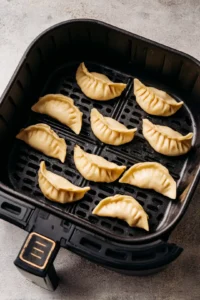 Arrange dumplings in a single layer in the air fryer