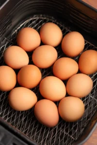 Arrange eggs in basket and cook for 15 minutes
