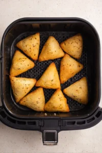 Arrange frozen samosas in a single layer in the air fryer basket