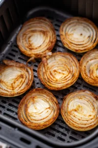 Arrange onion slices in air fryer