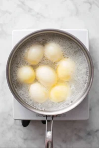 Boil eggs for 6-7 minutes for a slightly soft center