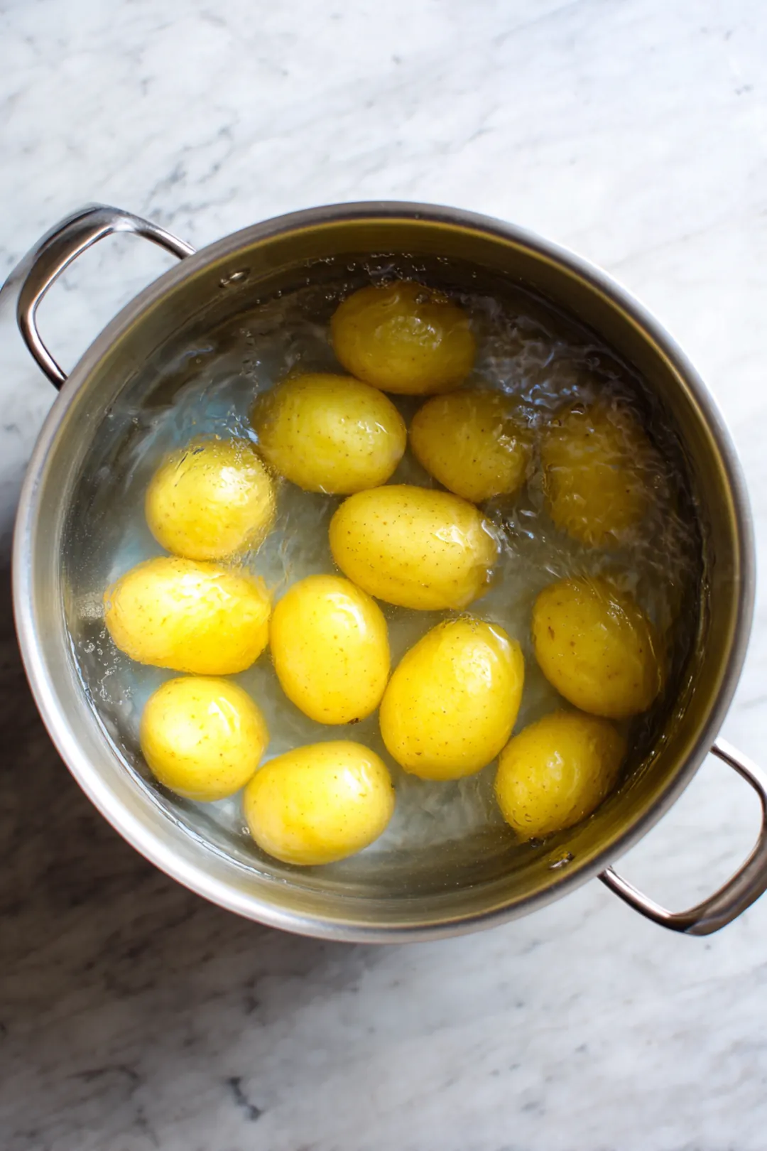 Boil Yukon Gold potatoes until fork-tender