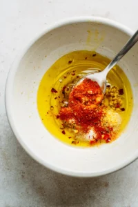 Brush the corn ribs with olive oil, lime juice, and spices