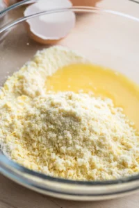 Coat frozen ice cream balls with cornflake mixture