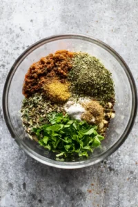 Combine ground lamb with spices and herbs