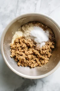 Combine ground turkey, breadcrumbs, parmesan cheese, egg, garlic powder, onion powder, salt, and black pepper in a mixing bowl