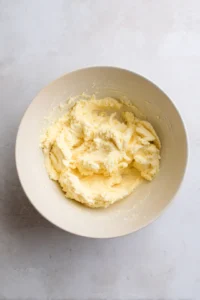 Combine softened butter and brown sugar until creamy