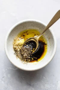 Combine soy sauce, honey, olive oil, garlic powder, black pepper, and salt to create the marinade