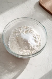 Combine the all-purpose flour and salt with lukewarm water to form a dough